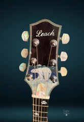 Leach 25th Anniversary Polar Bear Guitar headstock with mother-of-pearl tuner buttons